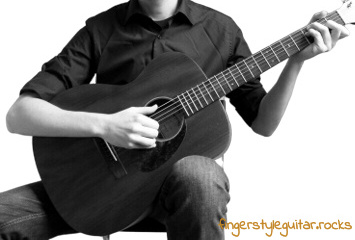Classical sitting position while playing fingerstyle guitar